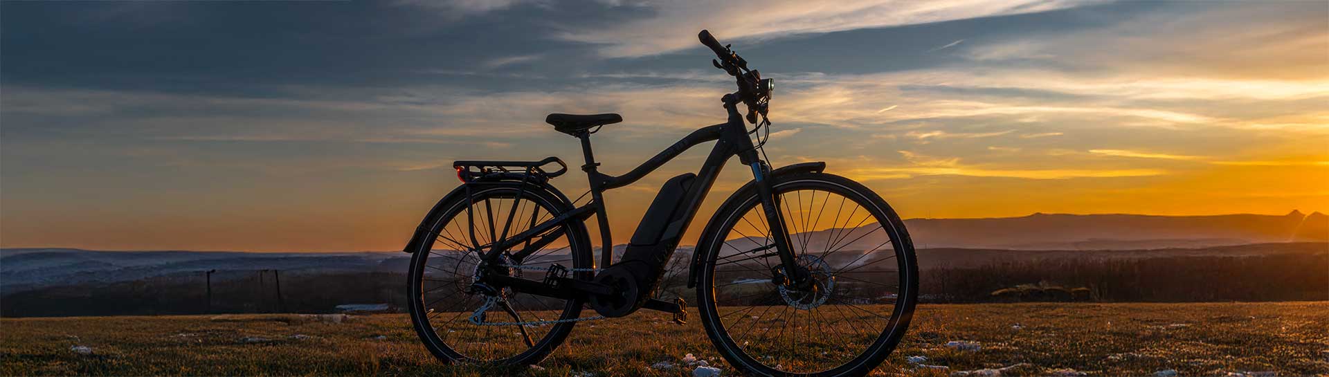 Electric bike with sunrise in background